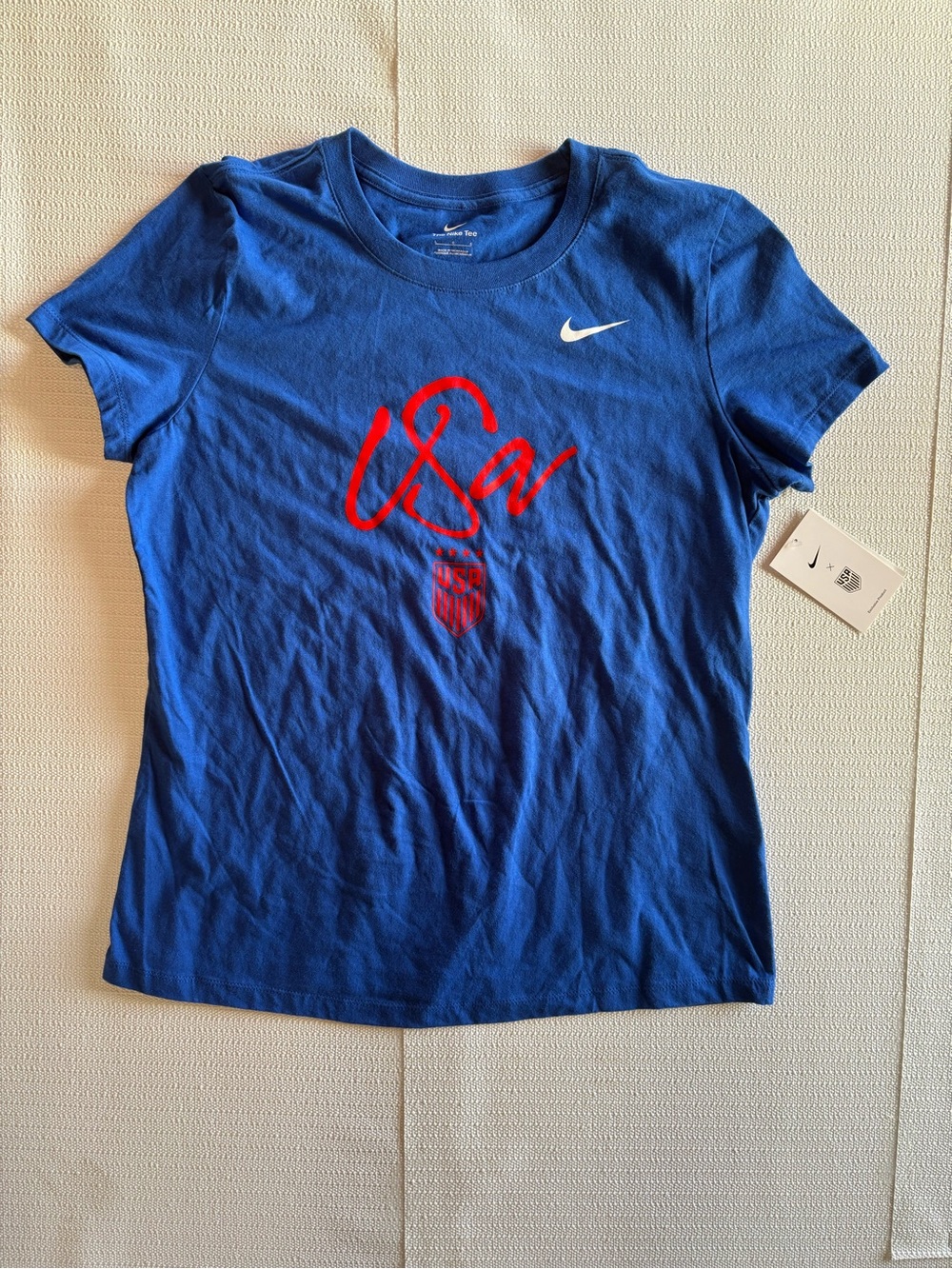 NWT Women’s Nike Blue Soccer Tee with Red USA Logo and White Swoosh